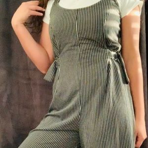 Black and white striped jump suit